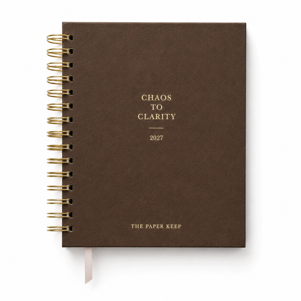A 2027 spiral-bound planner by The Paper Keep, featuring a textured dark brown cover with gold foil lettering and a gold wire coil binding, shown on a clean white background.